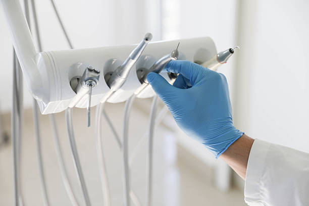 Professional Tooth Extraction technician working in Belwood, NC
